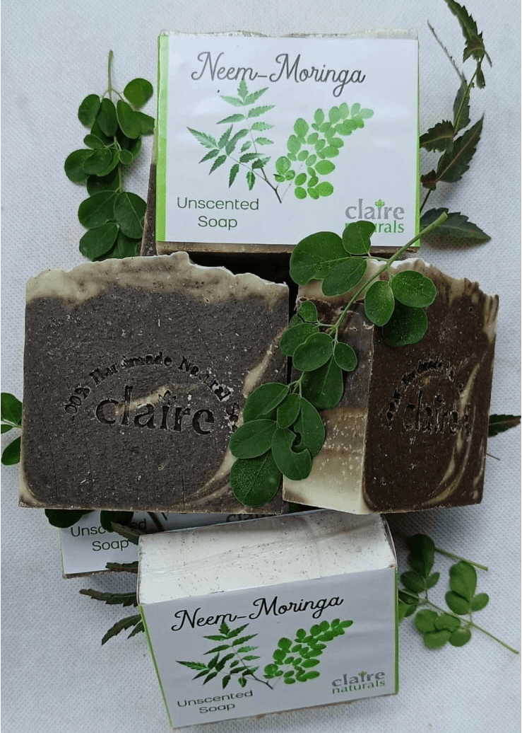 Stack of hand-cut bar soaps on a woven cloth